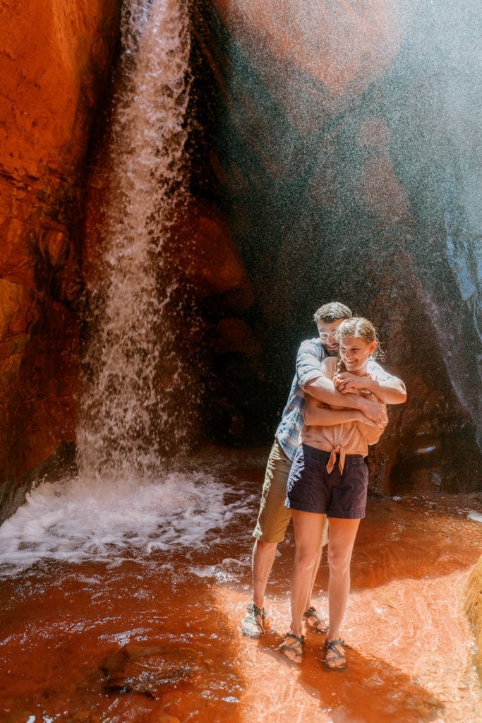 adventure engagement photography at a waterfall in Moab