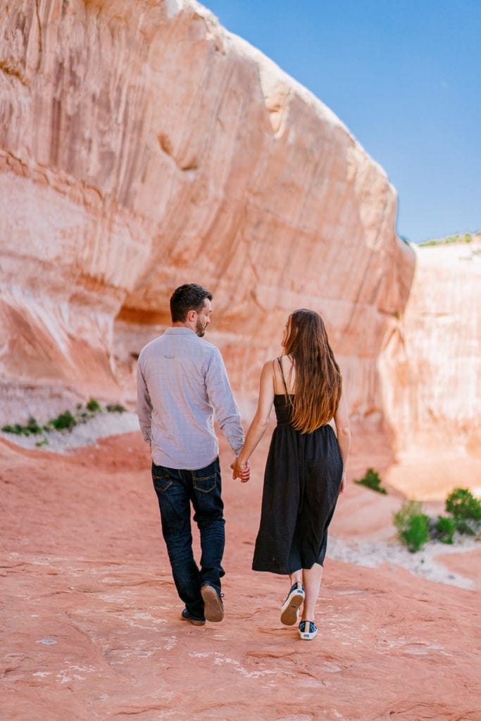 engaged in Moab | engagement session with arches, red rocks, canyons, and waterfalls