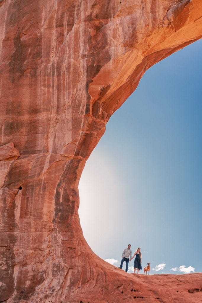 Engagement photography session in Arches National Park | photographer in Moab, UT | engagement photography with a dog | adventure session in Moab, Utah
