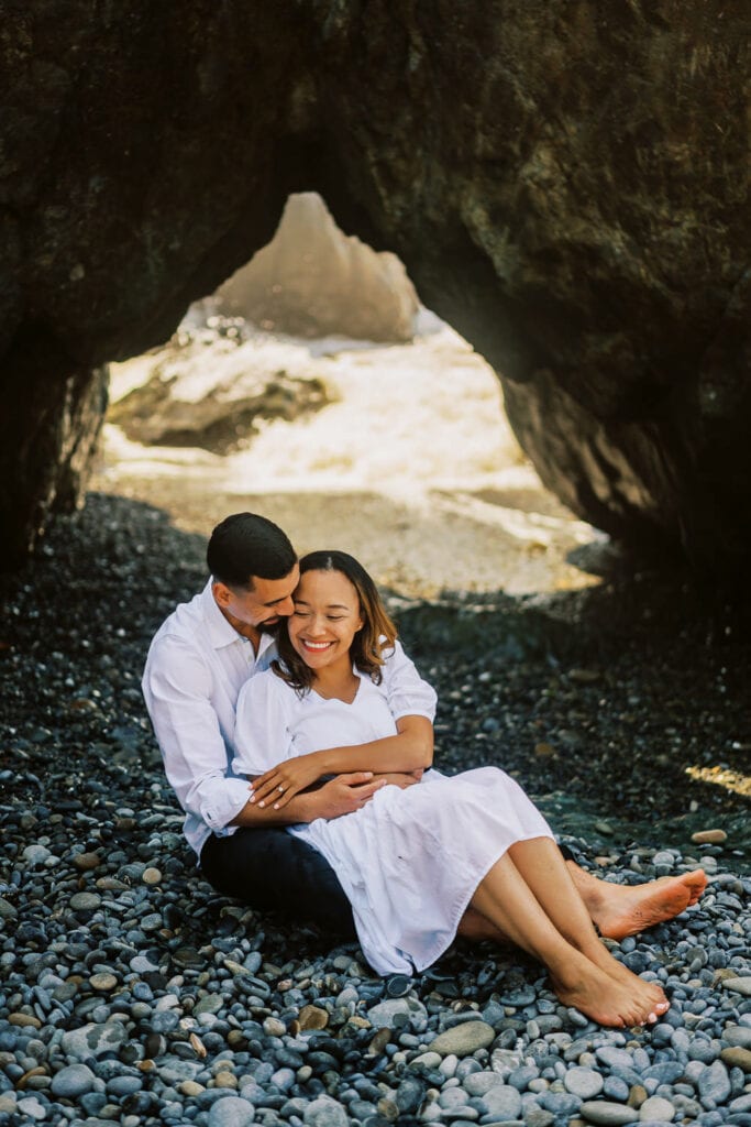 Bride and groom embrace during elopement photos at their elopement on Ruby Beach in Olympic National Park.
