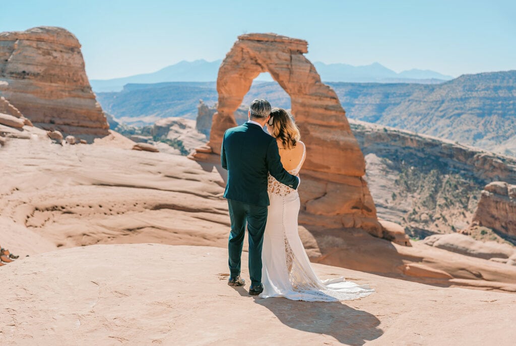 Delicate Arch wedding ceremony near Moab, Utah.