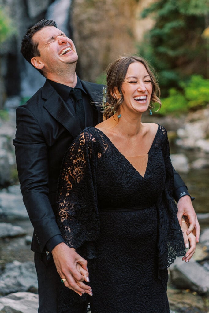 Couple laughing together during their elopement in Colorado.