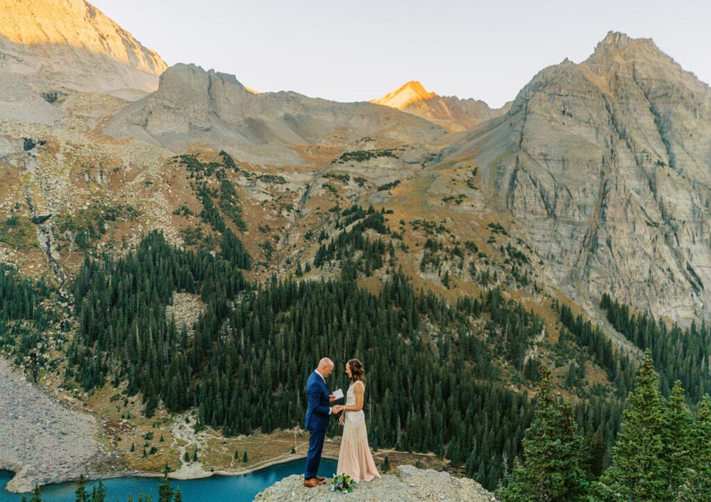 Bride and groom self solemnize their elopement in the mountains of Colorado.