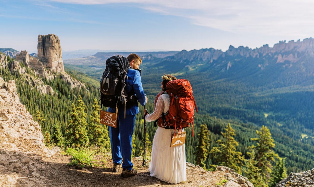 Bride and groom go on a wedding hike together in Colorado.