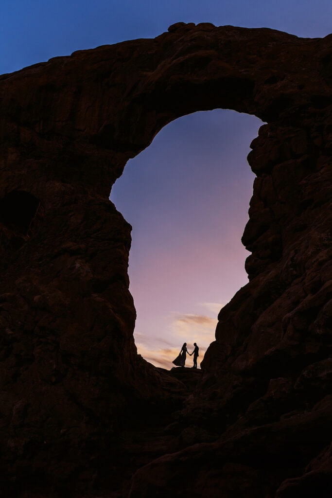 Arches National Park elopement in Moab, Utah just after sunset.